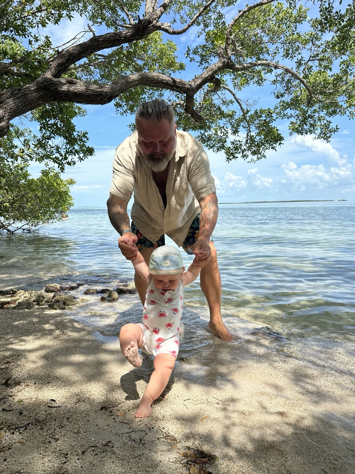 Jonathan Berryhill sharing a joyful moment with his grandson